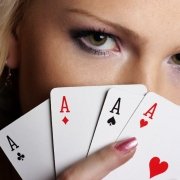 Girl's eyes and four cards