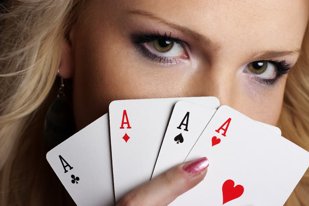 Girl's eyes and four cards