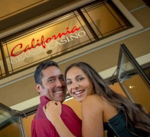 couple at the entrance to the California Grand